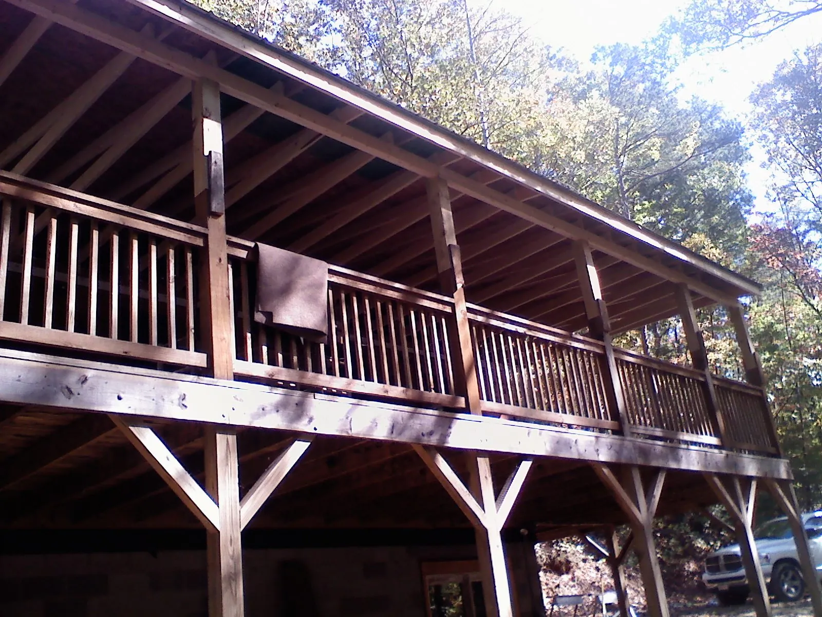 Timber framing under a new elevated porch and deck — Roof Leak Repair in Anchorage by Roofing Brothers